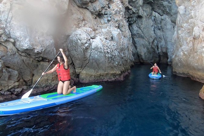 Santorini: Stand-Up Paddle and Snorkel Adventure - SUP on Santorini: learning balance, then cruising the cliff coast