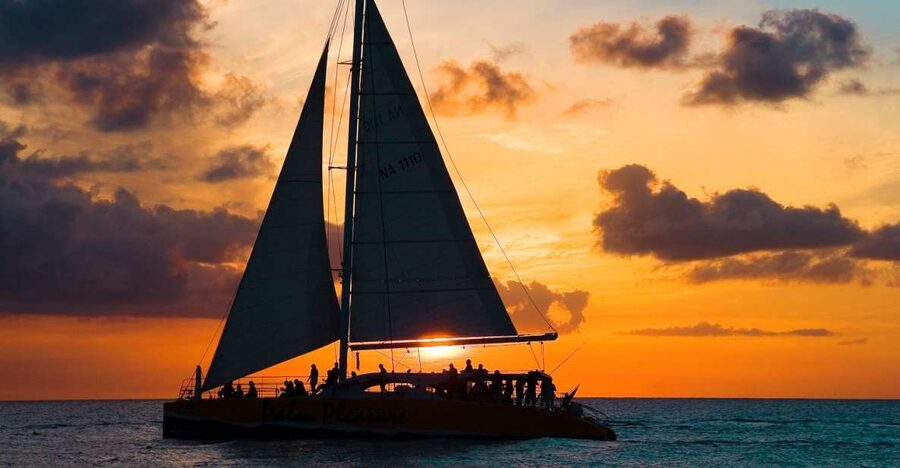 Santorini: Sunset Caldera Cruise with BBQ Meal and Drinks - The Sailing Route: From Akrotiri to the Red and White Beaches