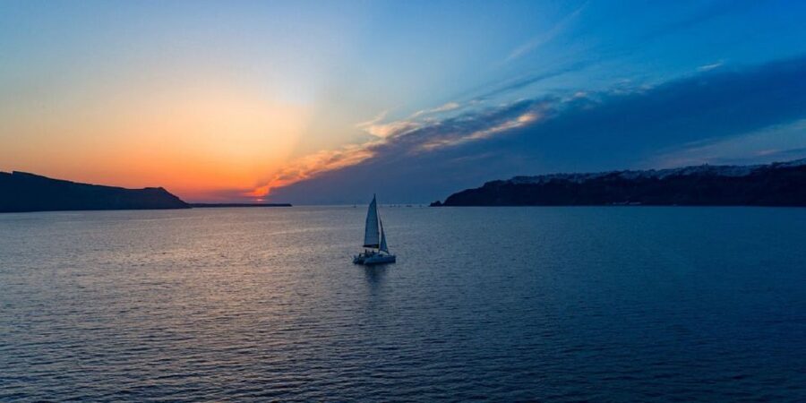 Santorini: Sunset Cruise with Swim Stops, Dinner, and Drinks - Red Beach Swim and Snorkeling: What You’ll Actually Do in the Aegean