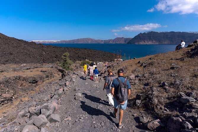 Santorini Sunset Cruise - Stop 1: Thirassia island, hot-springs swim, and a jetty dinner