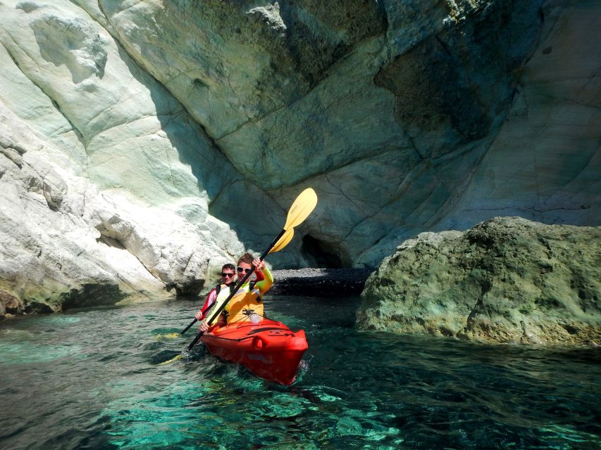 Santorini: Sunset Sea Kayak with Light Dinner - Pickup, meeting point, and timing that follows the sun