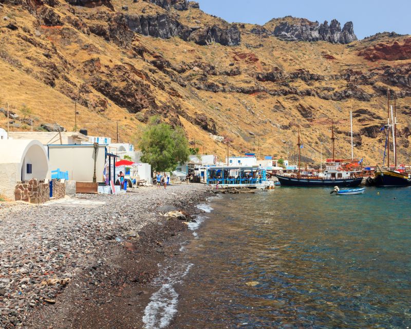 Santorini: Thirassia Islands and Volcano Guided Cruise - Palea Kameni hot springs: sulfur water, short swim time, and safety