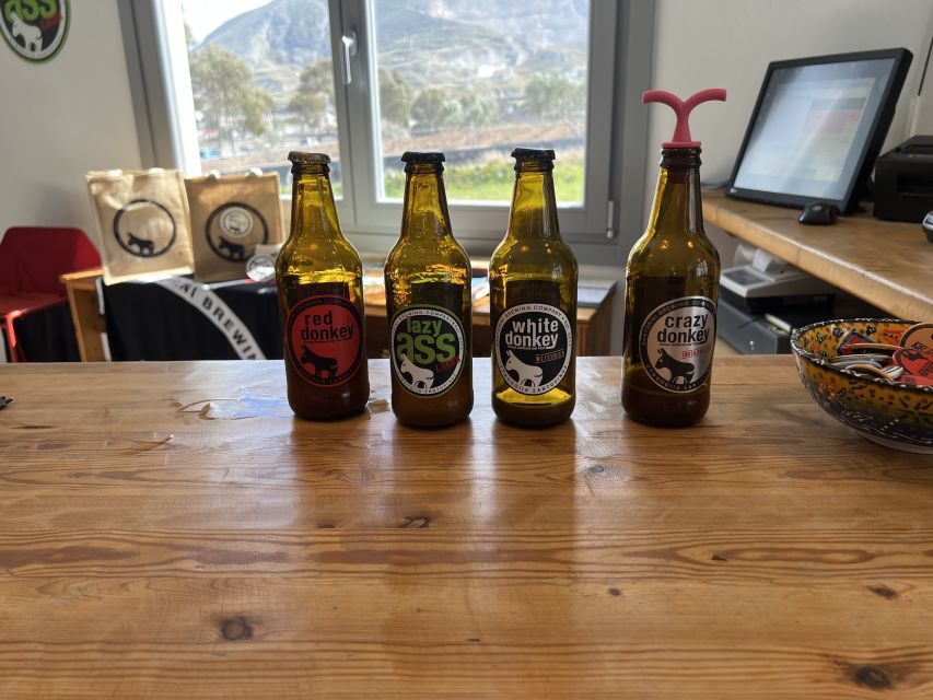 Santorini: Three Wineries and One Brewery Tour with Tastings - Stop 2, Art Space Winery in Exo Gonia: Art, Cave Cool, and Village Charm