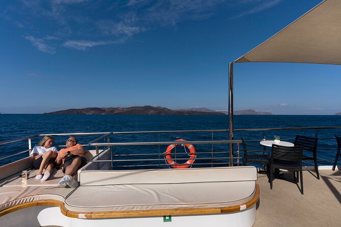 Santorini Tour of Caldera with Glass bottom Boat - Hot springs at Palaia Kameni: a quick swim near Agios Nikolaos