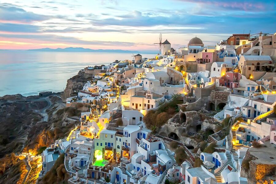 Santorini: Traditional Sightseeing Bus Tour with Oia Sunset - The guide and driver effect, why it feels better than it sounds