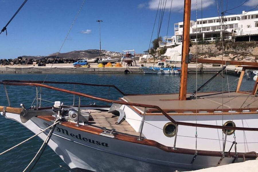 Santorini: Traditional Wooden Boat Tour with Meal and Wine - Red and White Beaches Stop: Photos First, Then In-Water Time