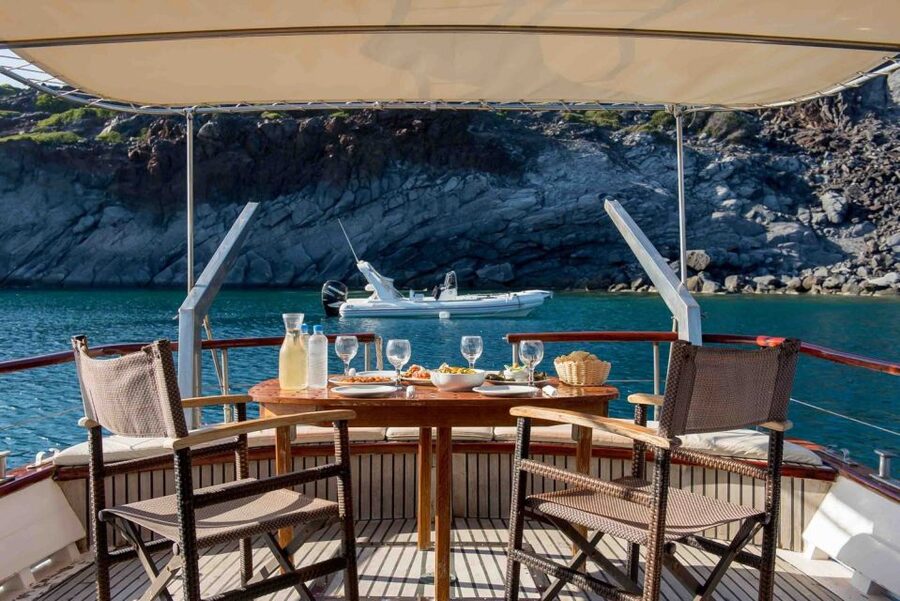 Santorini: Traditional Wooden Boat Tour with Meal and Wine - Hot Springs Swim: Volcanic Heat Without the Climb