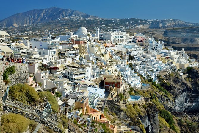 Santorini: Walking Tour of Fira - Saint John the Baptist, Pink Bell Top, and the Catholic Side of Fira