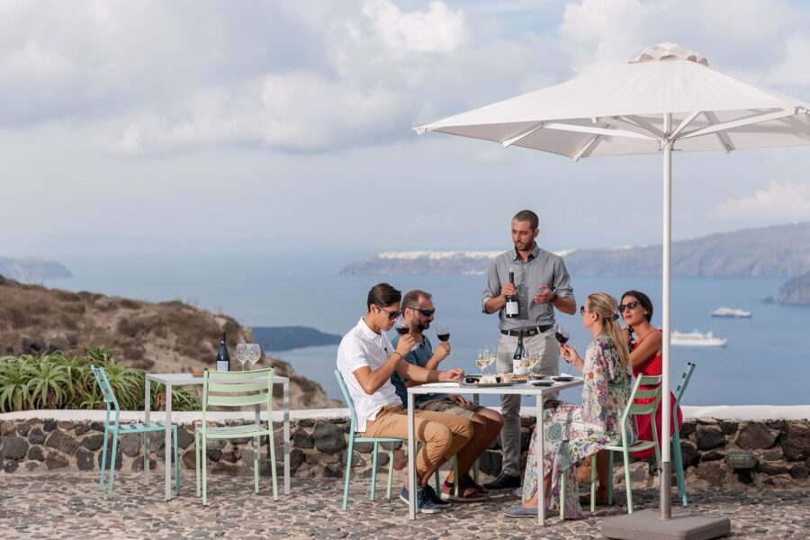 Santorini Wine Roads: Tour of 3 Wineries with a Sommelier - Pickup by Mercedes minibus and scenic island driving that makes the day easier
