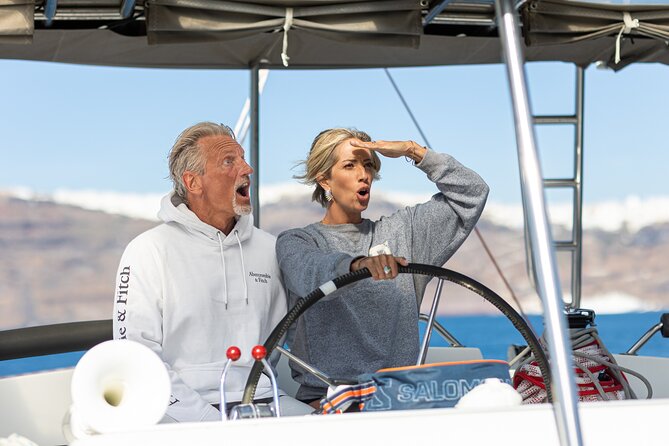 Semi Private Santorini Catamaran Tour - Red Beach stop: why it is more than a pretty color