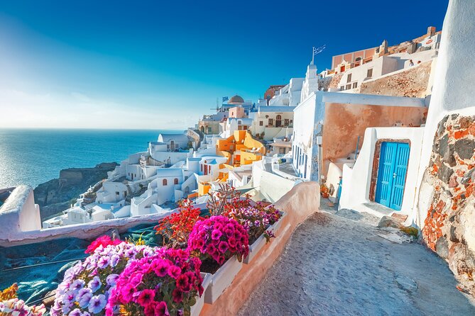 SKIP CABLE CAR® The Original Santorini Tour for Cruise Passengers - Getting started at Athinios: tender to boat, then minibus on the rim