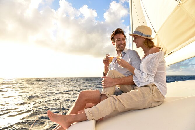 Small Group Santorini Catamaran Cruise with BBQ - Caldera cruising and lighthouse views after lunch