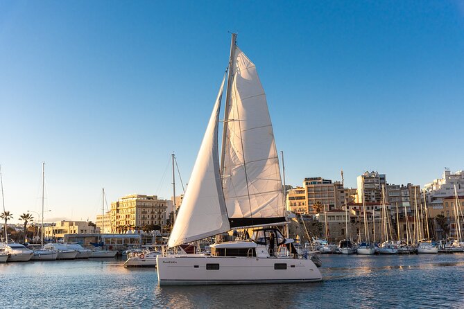 Small Group Santorini Catamaran Cruise with BBQ - Red Beach time: cliff views plus a real beach break