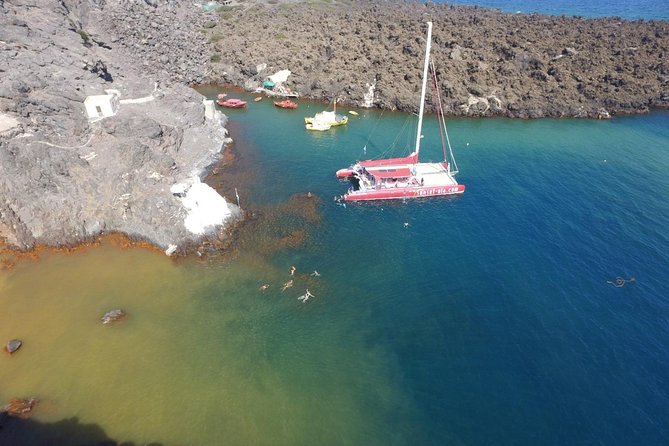 Sunset Sailing Catamaran Cruise in Santorini with BBQ and Drinks - Red Beach Snorkeling Stop: Quick Water Time on a Color-First Coast