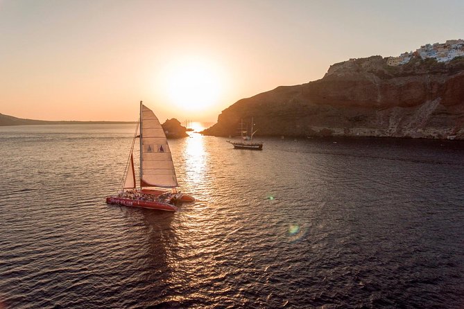 Sunset Sailing Catamaran Cruise in Santorini with BBQ and Drinks - Hot Springs Swim: Warm Water, Sulfur Smell, and 30 Minutes