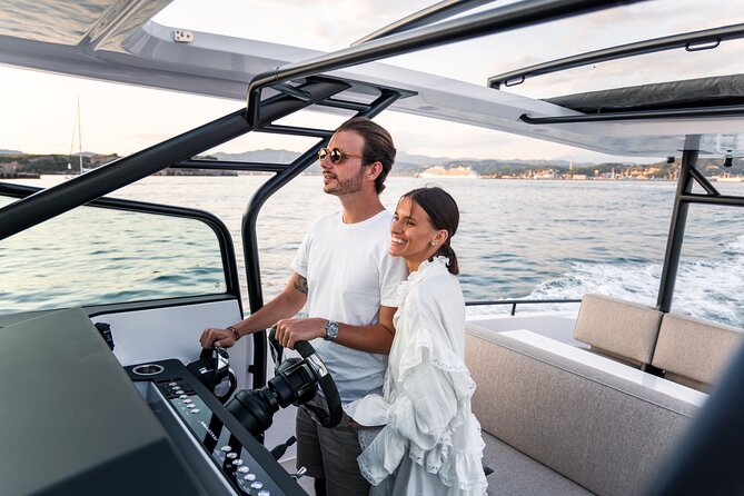 The Fastest Private Motor Yacht in Santorini - All Inclusive Tour - Volcano hot springs and Fira’s Old Port: quick sights with big context