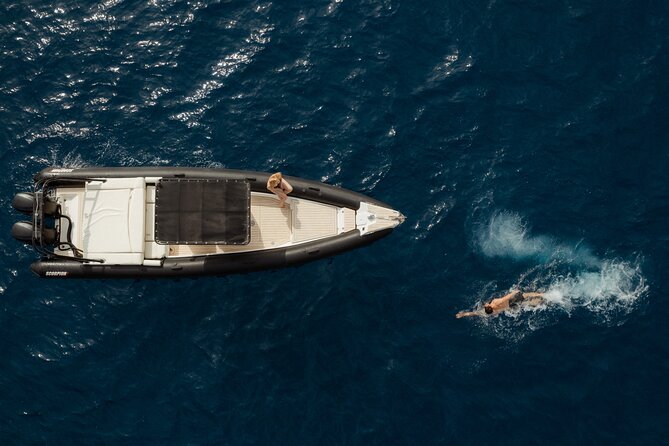 Unique Half-Day Private Motor Boat Cruise in Santorini - What is included on board, and how it affects value