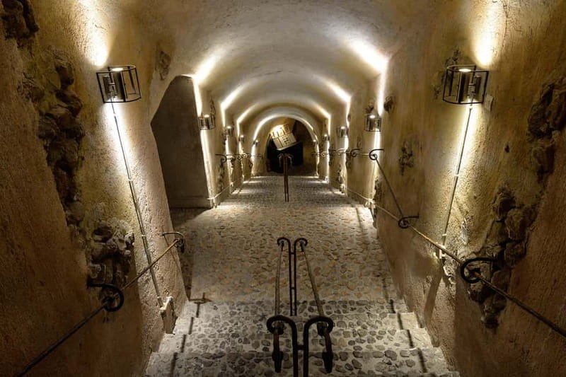 Vothonas: Wine Museum Ticket with Tastings and Audio Guide - Walking the Cave Museum: Cool Air and a Built-In Story