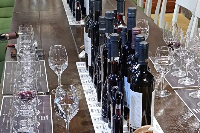 Wine Tasting & Highligh Experience in Santorini - The tasting setup: cheese, snacks, and mineral water that keep you comfortable